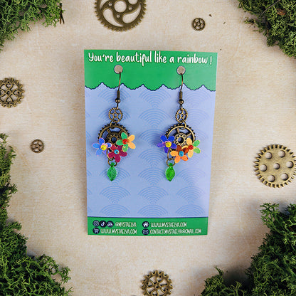 Boucles d'oreilles Oliver le jardinier - Fleurs irisées, steampunk et engrenages enchantés (La Clairière des Âmes Ferrées)
