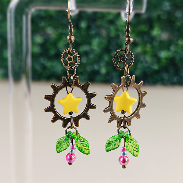 Boucles d'oreilles Pixy l'exploratrice - Fleur mécanique steampunk (La Clairière des Âmes Ferrées)