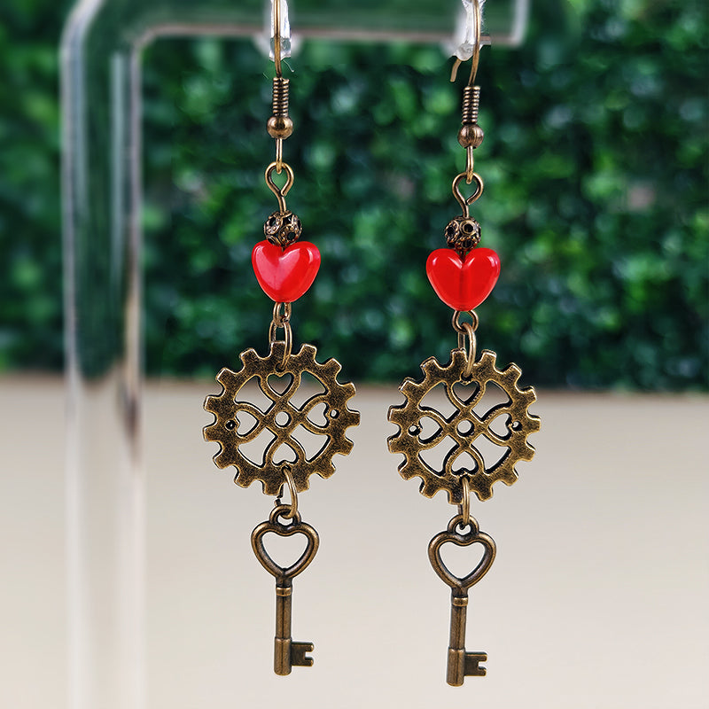 Boucles d'oreilles Sparky l'inventeur - Cœur, engrenages et clé steampunk (La Clairière des Âmes Ferrées)
