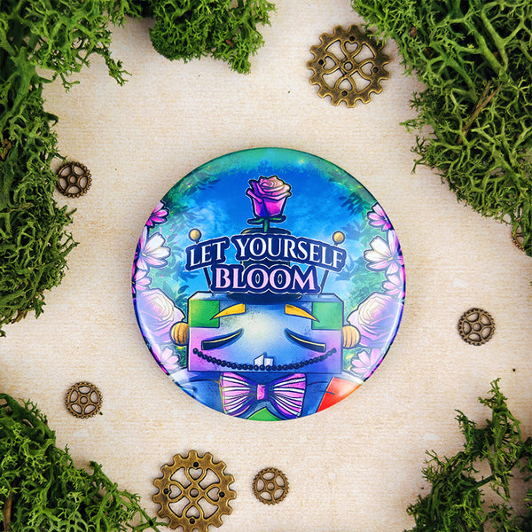 Badge 58mm "Let yourself bloom" – Oliver le jardinier au grand coeur - Kawaii fantasy floral (La Clairière des Âmes ferrées)