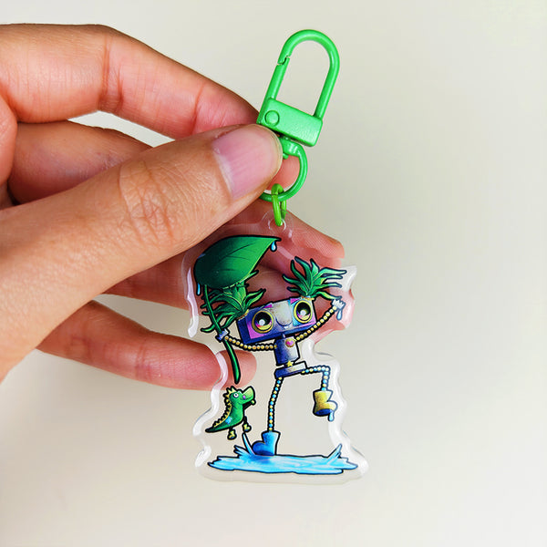 Porte-clés mystère Robots sous la pluie – 4 designs + 1 secret - Pixy & Mochi, Sparky, Vivy, Oliver (La Clairière des Âmes ferrées)
